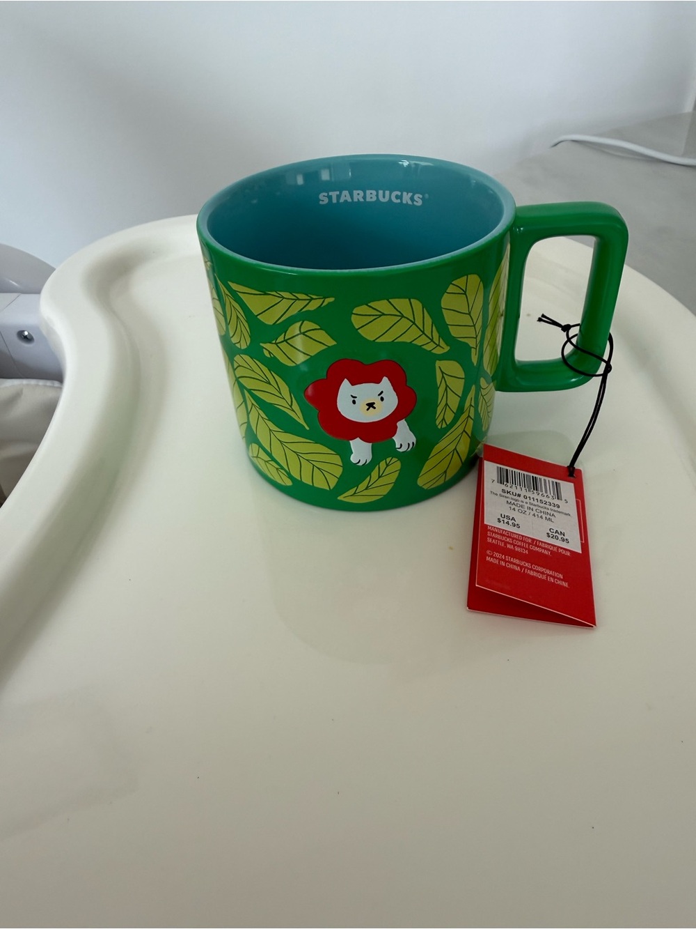 Starbucks Green and Teal Ceramic Mug with Leaf and Lion Motif